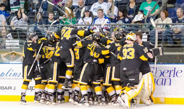The Wheat Kings celebrate on the ice moments after their Game 3 overtime win over Seattle. (T-Birds...