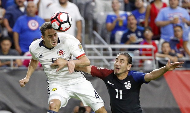 Colombia's Santiago Arias heads the ball during his team's third-place match win over the US. (AP)...