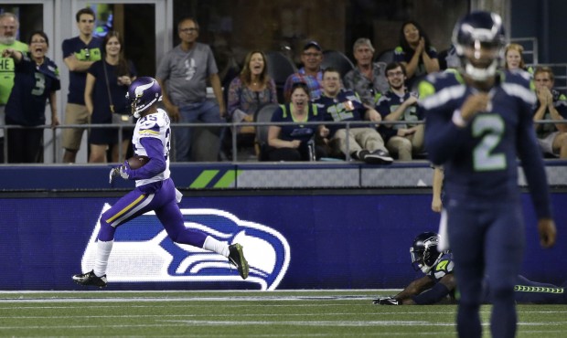 Vikings cornerback Marcus Sherels scored the game-winning touchdown on an interception return. (AP)...