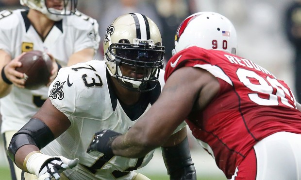 Jahri Evans, who has played on the right side his entire career, is trying out the left side with t...