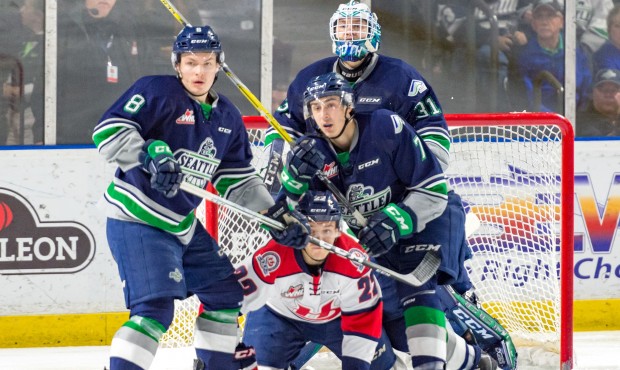 Scott Eansor and Reece Harsch fight for position during Seatle's 4-3 win Friday (Brian Liesse/T-Bir...