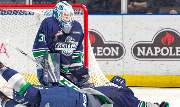 Rylan Toth makes one of his 26 saves during Seattle's 3-0 win over Tri City (Brian Liesse/T-Birds)...
