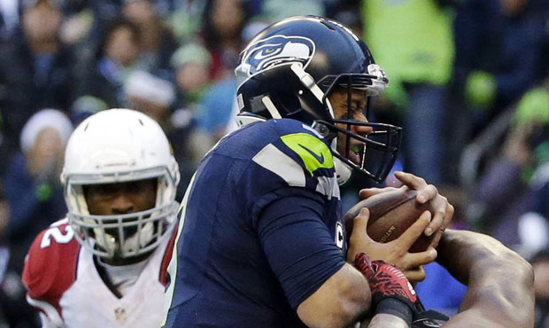 Russell Wilson has been sacked 40 times this season, a product of the Seahawks' O-line struggles. (...
