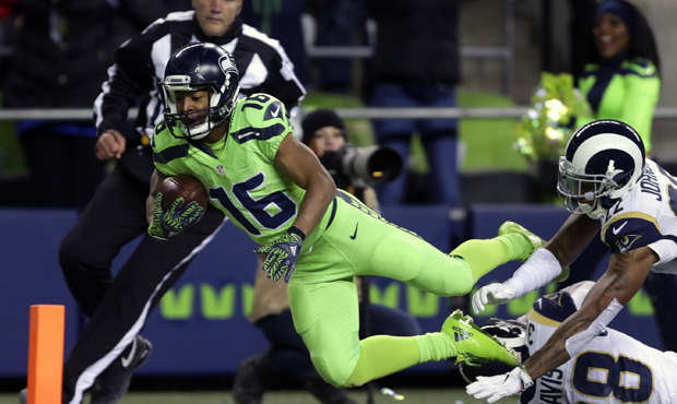 Tyler Lockett caught seven passes for 130 yards, including this 57-yard touchdown from Russell Wils...