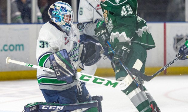 Seattle's Rylan Toth makes one of his 38 saves during Friday's 4-3 win over Everett (Brian Liesse/T...