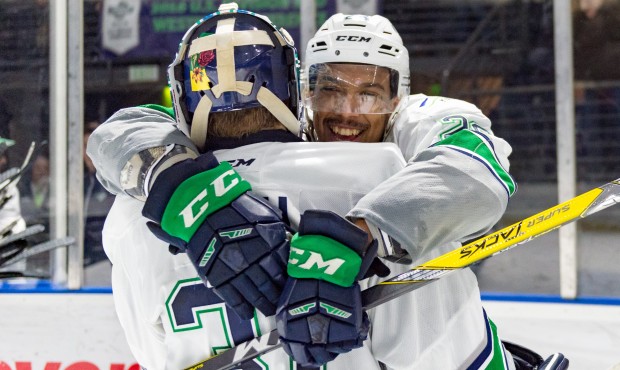Keegan Kolesar celebrates with Rylan Toth after scoring the overtime winner for Seattle (Brian Lies...