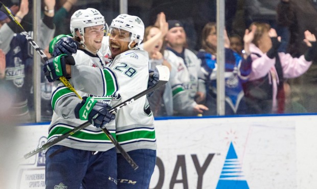 Ryan Gropp and Keegan Kolesar celebrate Gropp's fifth career hat trick Saturday night (Brian Liesse...