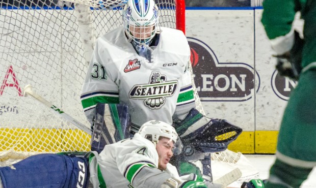 Seattle's Turner Ottenbreit dives in front of Rylan Toth to block a shot Friday night (Brian Liesse...
