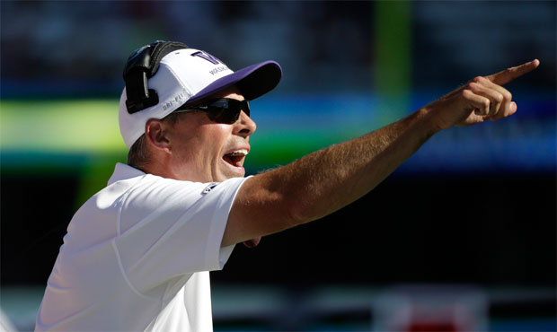 Chris Petersen's extension with UW reportedly makes him the Pac-12's top-paid coach at $4.9 million...