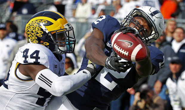 Safety Delano Hill rose up draft boards after running the 40-yard dash in 4.47 seconds at the NFL c...