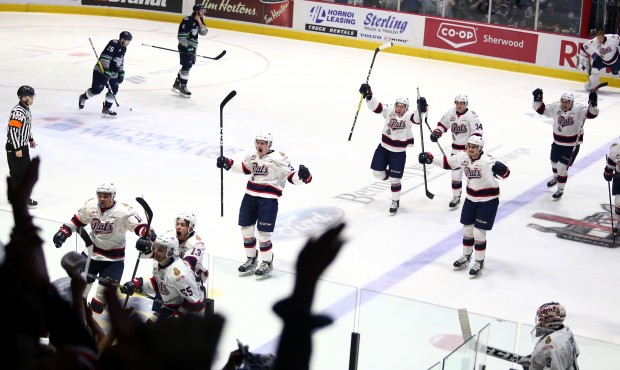 The Regina Pats celebrate their 4-3 overtime win in Saturday's Game 2 (Keith Hershmiller/Regina Pat...