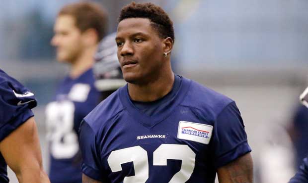 Oklahoma State running back Chris Carson, left, is hit by Colorado linebacker Rick Gamboa as he run...