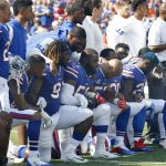 
              Buffalo Bills players take a knee during the playing of the national anthem prior to an NFL football game against the Denver Broncos, Sunday, Sept. 24, 2017, in Orchard Park, N.Y. (AP Photo/Jeffrey T. Barnes)
            