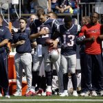 
              New England Patriots head coach Bill Belichick, left, and Tom Brady (12) Phillip Dorsett (13) Matthew Slater, second from right, and David Harris (45) stand during the national anthem before an NFL football game against the Houston Texans, Sunday, Sept. 24, 2017, in Foxborough, Mass. (AP Photo/Steven Senne)
            