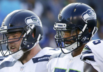 Seattle Seahawks offensive guard Oday Aboushi (73) stands alongside teammate linebacker D.J. Alexan...