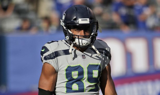 Doug Baldwin put his arm around Tom Cable during Cable's press conference Wednesday. (AP)...