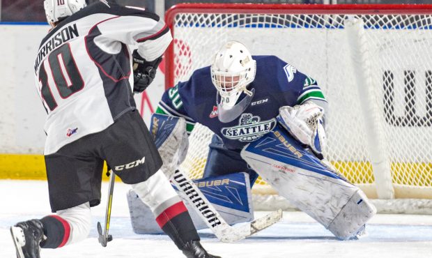 Thunderbirds goalie Liam Hughes stops Vancouver's Brad Morrison during Tuesday's win in the  shoot ...