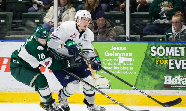 Seattle's Turner Ottenbreit fights for position with former teammate Luke Ormsby during Seattle's 3...