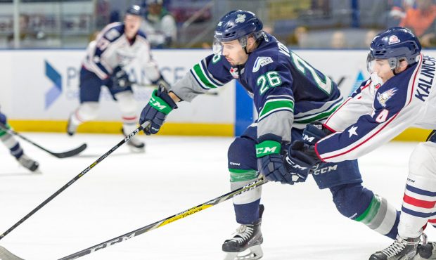 Seattle's Nolan Volcan fights for the puck during the Thunderbirds 4-0 loss to Tri City (Brian Lies...