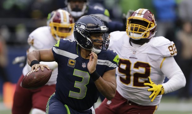 Russell Wilson threw two touchdowns in the fourth quarter after a rough first three frames. (AP)...