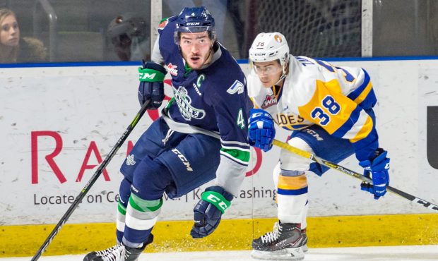 Thunderbirds captain Turner Ottenbreit carries the puck up ice during Seattle's 4-1 victory Tuesday...