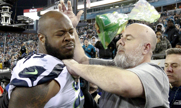 Quinton Jefferson tried to climb into the stands after being hit by projectiles in Jacksonville. (A...