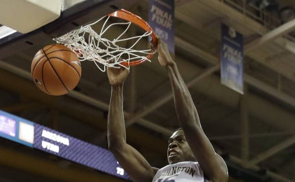 Noah Dickerson has been a strong presence in the paint for Mike Hopkins' surprising Huskies team. (...