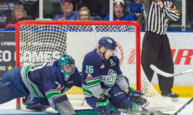 Liam Hughes gets some help from Nolan Volcan during Seattle's 2-1 overtime loss to Everett (Brian L...