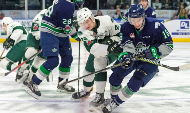 Noah Philp fights for the puck during Seattle's Game 1 loss to Everett Friday night (Brian Liesse/T...