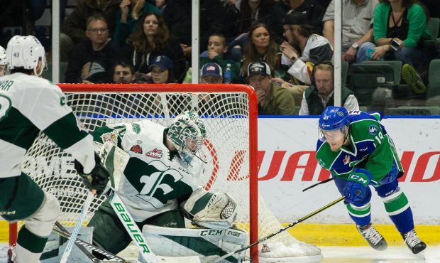 Playing his last home game as a Silvertip, Carter Hart makes a big save during Game 5 (Christopher ...
