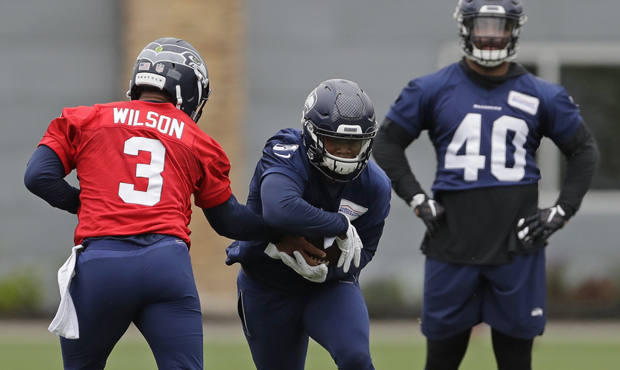 A strong run game would be huge for the Seahawks and Russell Wilson, says Dave Wyman. (AP)...