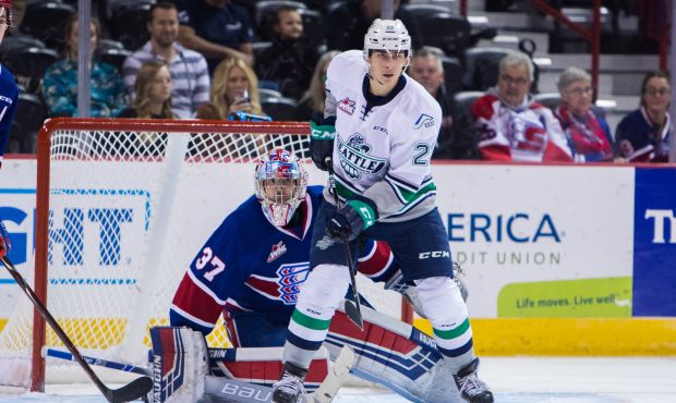 Seattle's Dillon Hamaliuk looks to screen Spoake goalie Dawson Weatherill Friday night. (Larry Brun...