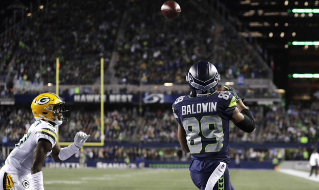 Seattle Seahawks wide receiver Doug Baldwin (89) catches a pass for a touchdown in front of Green B...