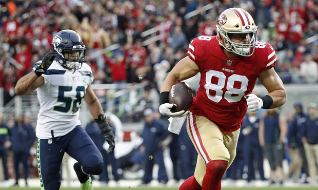 The Seahawks allowed this Garrett Celek TD but also set a team record for penalty yardage. (AP)...