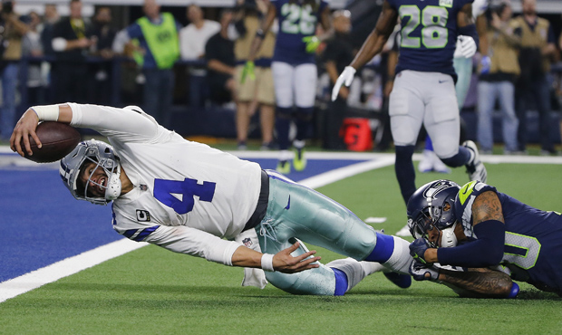 Dak Prescott's third-and-14 run may have been the biggest play in the Seahawks' loss. (AP)...