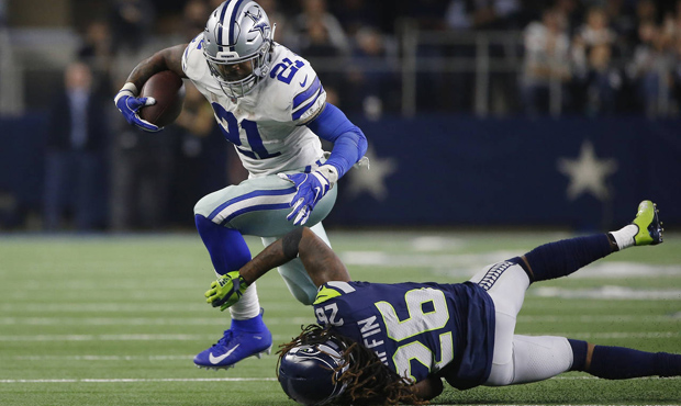 Ezekiel Elliott scored one of the Cowboys two fourth-quarter TDs against the Seahawks. (AP)...