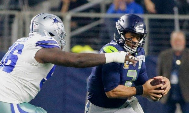 Penalties and a defensive breakdown kept Russell Wilson from leading a Seahawks comeback. (AP)...