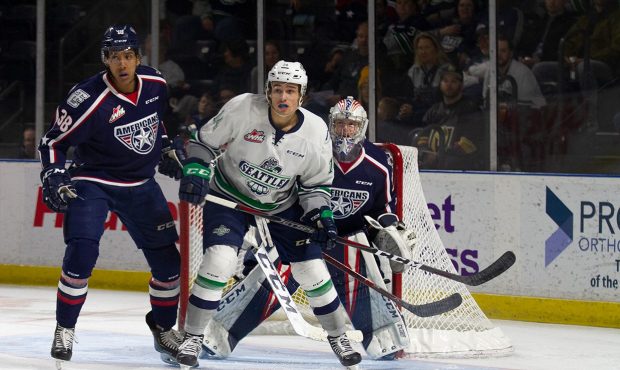 Seattle's Tyler Carpendale fights for position in front of Tri-City goalie Beck Warm (Frank Pray/T-...