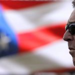 
              Oakland Athletics manager Bob Melvin stands during the national anthem before a spring training baseball game against the Seattle Mariners, Friday, Feb. 22, 2019, in Peoria, Ariz. (AP Photo/Charlie Riedel)
            