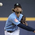 
              Seattle Mariners starting pitcher Mike Leake throws during the first inning of a spring training baseball game against the Oakland Athletics, Friday, Feb. 22, 2019, in Peoria, Ariz. (AP Photo/Charlie Riedel)
            