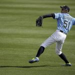 
              Seattle Mariners right fielder Ichiro Suzuki warms up in the outfield before the second inning of a spring training baseball game against the Oakland Athletics, Friday, Feb. 22, 2019, in Peoria, Ariz. (AP Photo/Charlie Riedel)
            