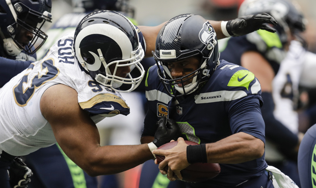 Jim Moore wants the Seahawks to pursue Ndamukong Suh to helps its run defense. (Getty)...