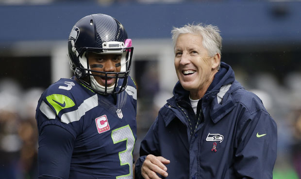 Russell Wilson's new deal with keep him with the Seahawks for the next five seasons. (AP)...