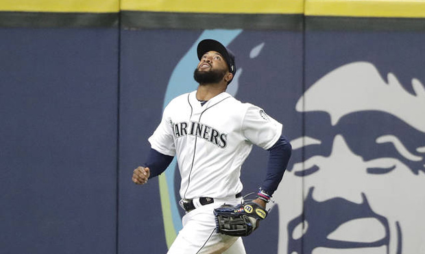 Mariners OF Domingo Santana has struggled in his transition to left field from right. (AP)...