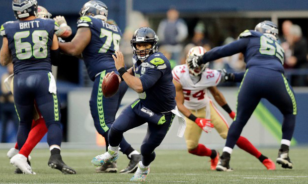 In an 18-game NFL schedule, Seahawks QB Russell Wilson could only play 16 games. (AP)...
