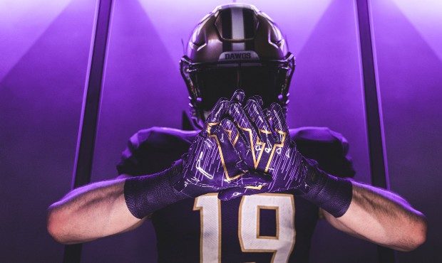 The UW Huskies revealed their new football uniforms on July 10. (Adidas.com photo)...