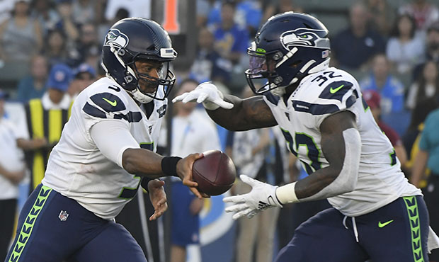 Seahawks QB Russell Wilson, RB Chris Carson...