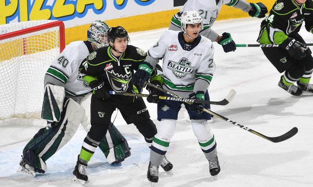 Seattle Thunderbirds goalie  Blake Lyda attempts to look through traffic against the Edmonton Oil K...