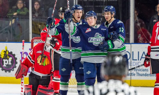 Payton Mount (center) celebrates his second period power-play goal during the Thunderbirds 5-4 win ...