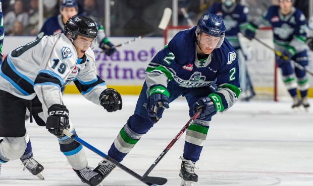 Seattle's Simon Kubicek fights for the puck with Vegas Golden Knights prospect Peyton Krebs during ...